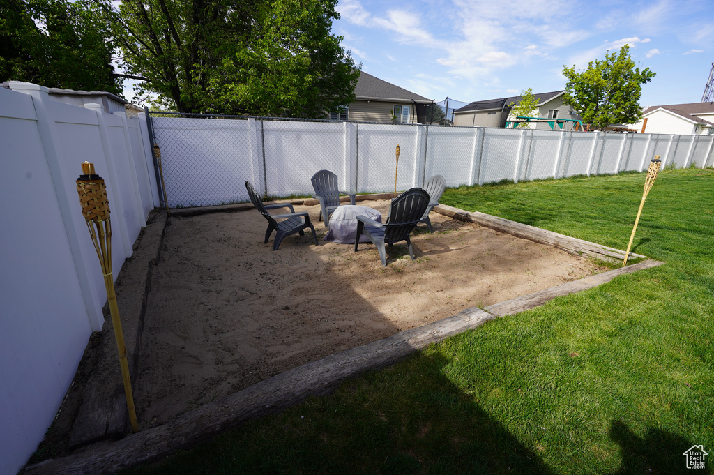 View of yard with a fenced backyard