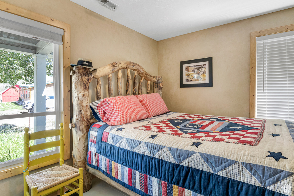 Bedroom with visible vents