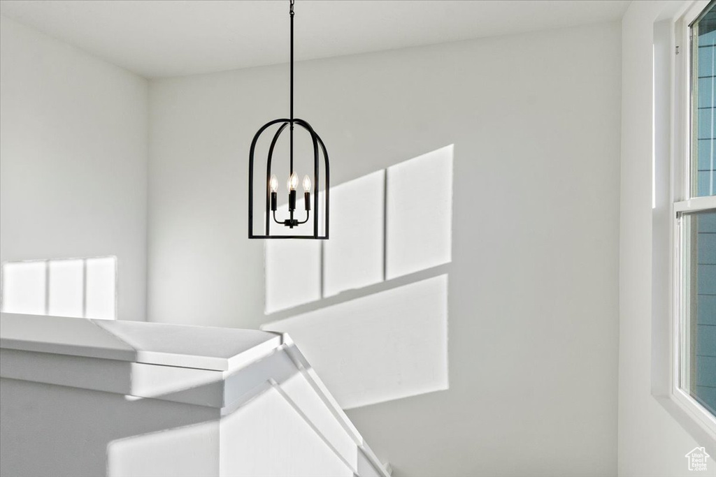 Interior details featuring an inviting chandelier