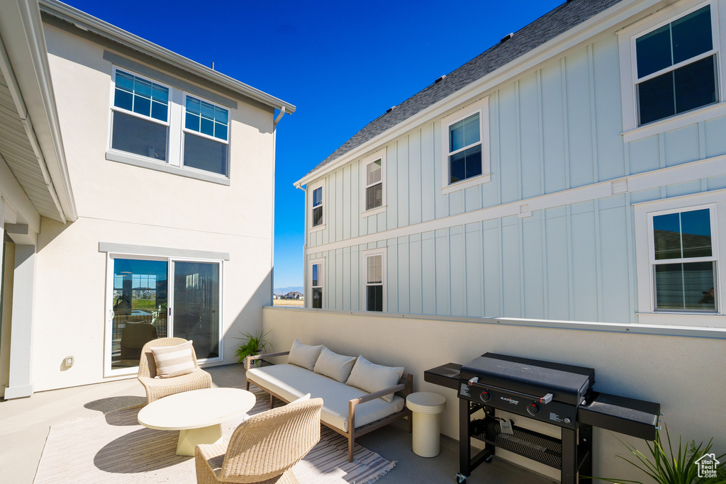 View of patio featuring grilling area and an outdoor living space