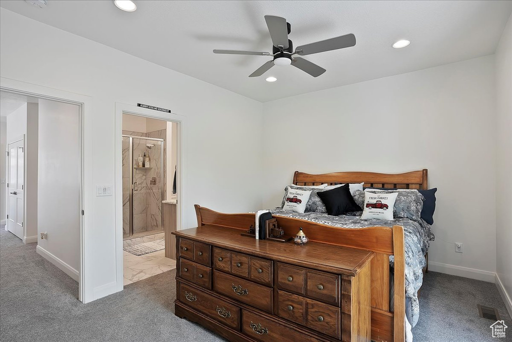 Carpeted bedroom featuring recessed lighting, ensuite bath, a ceiling fan, visible vents, and baseboards