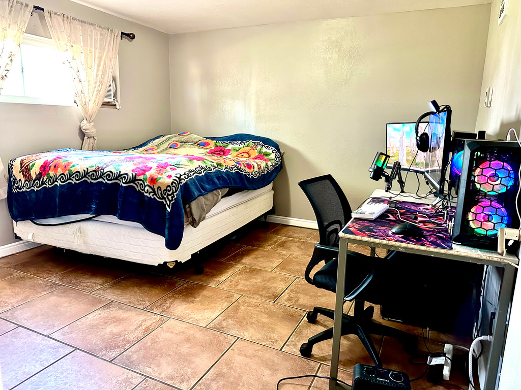 Bedroom with baseboards