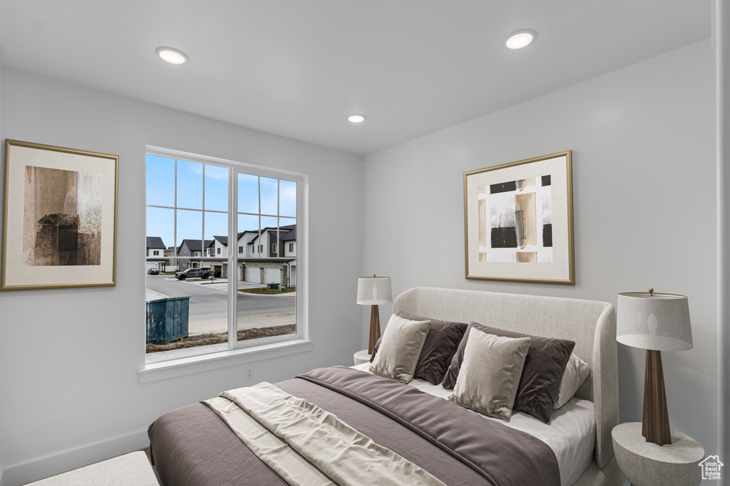 Bedroom with baseboards and recessed lighting