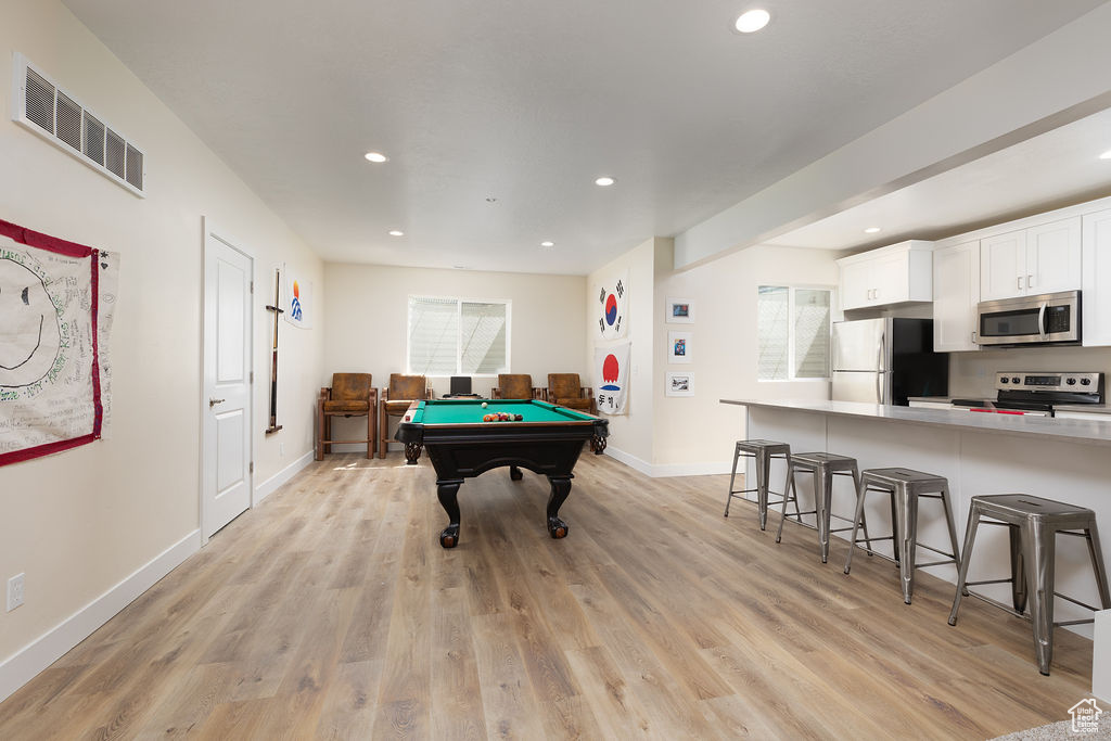 Game room with visible vents, baseboards, recessed lighting, light wood finished floors, and pool table