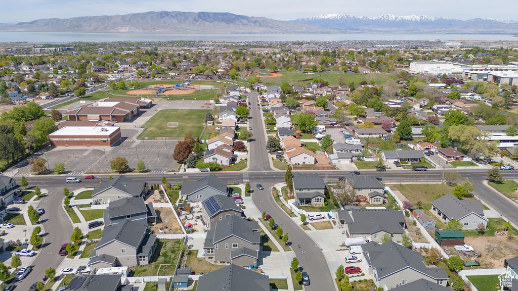 Bird's eye view featuring a residential view and a water and mountain view