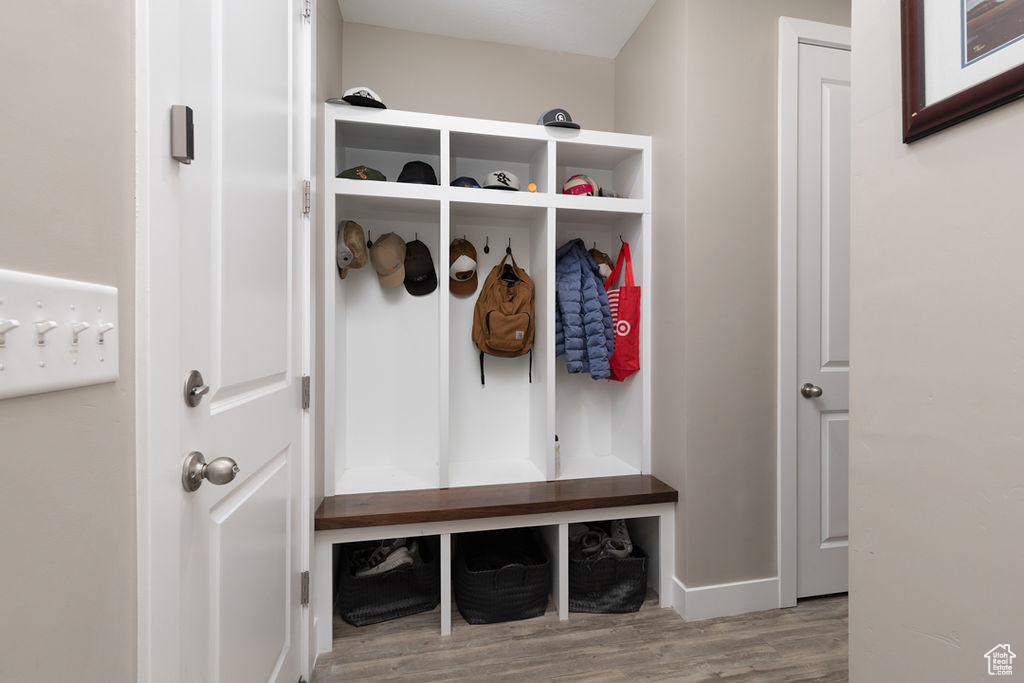 Mudroom with wood finished floors