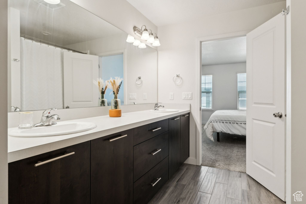 Bathroom with double vanity and a sink
