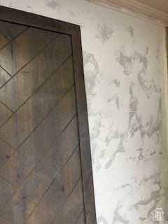Interior details featuring crown molding