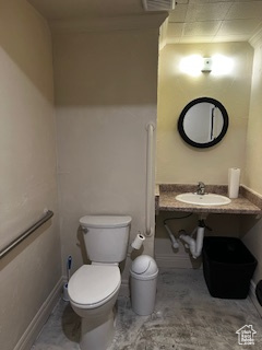 Bathroom with toilet and a sink