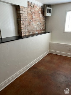 Interior space featuring baseboards