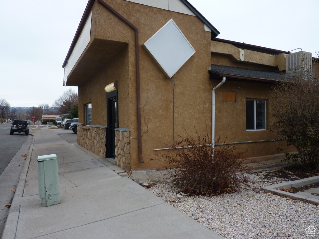 View of side of property with stucco siding
