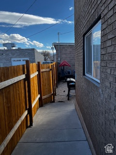 View of home's exterior featuring fence