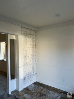 Empty room with baseboards