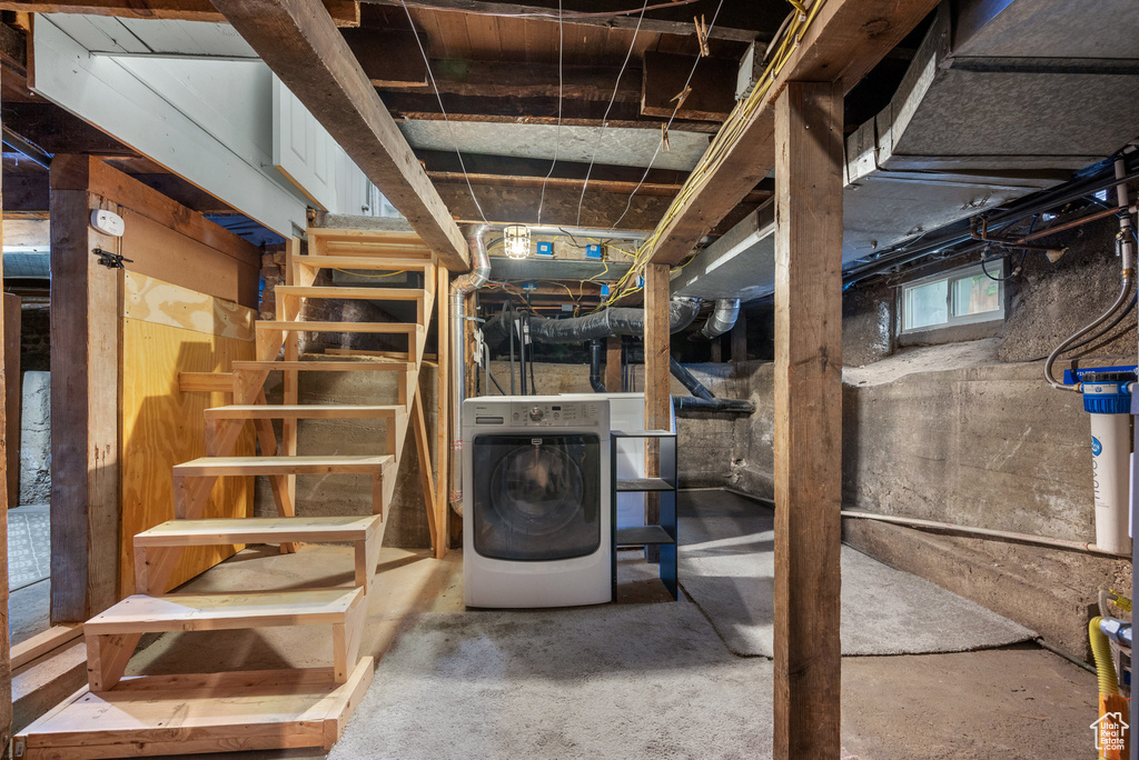Basement with washer / clothes dryer
