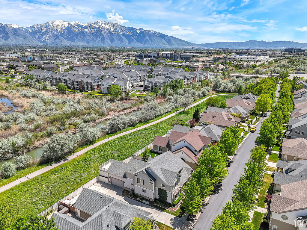 Aerial view of residential area with a mountainous background