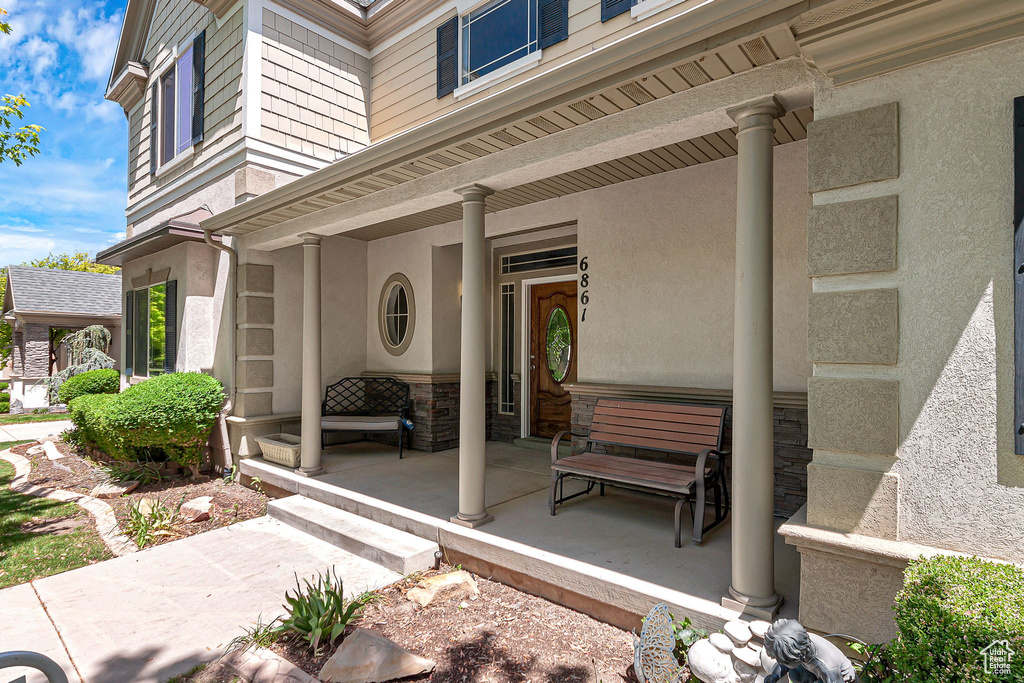 View of patio with a porch