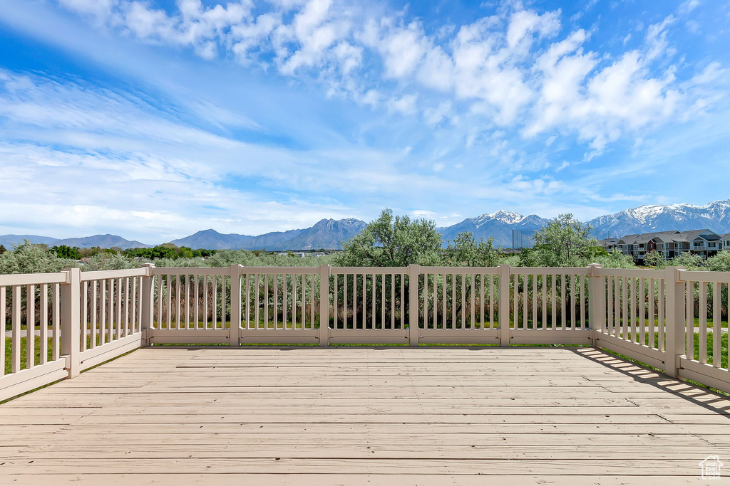 Wooden deck featuring a mountain view