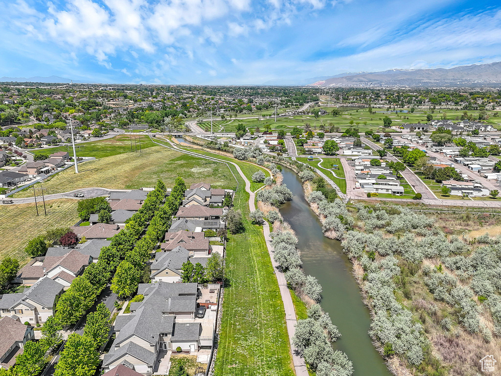 Aerial view of residential area featuring a water and mountain view