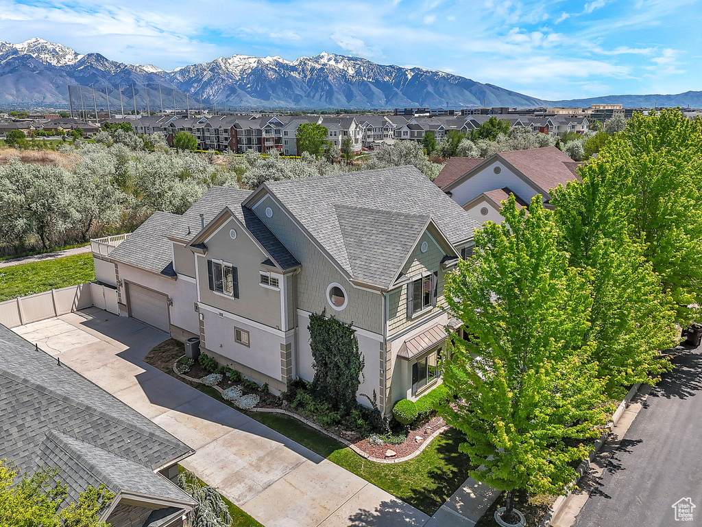 Aerial view of residential area with a mountainous background
