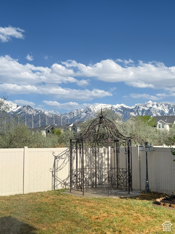 View of yard with a mountain view