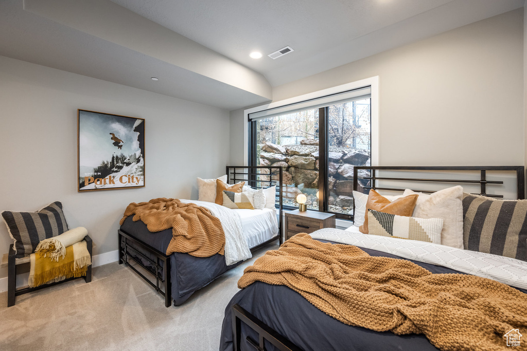 Bedroom featuring baseboards, visible vents, light colored carpet, and recessed lighting