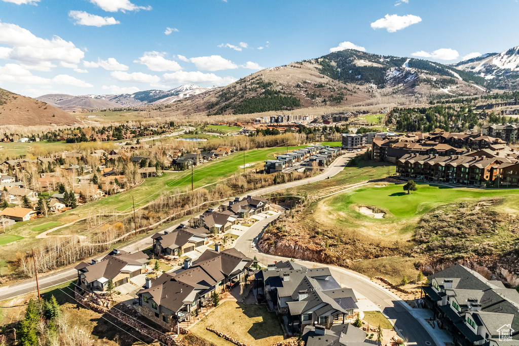 Birds eye view of property with a residential view, a mountain view, and view of golf course