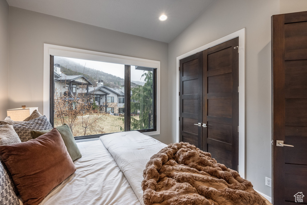 Bedroom featuring recessed lighting and access to exterior
