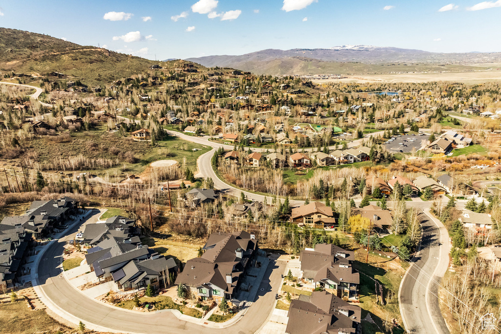 Birds eye view of property with a residential view and a mountain view
