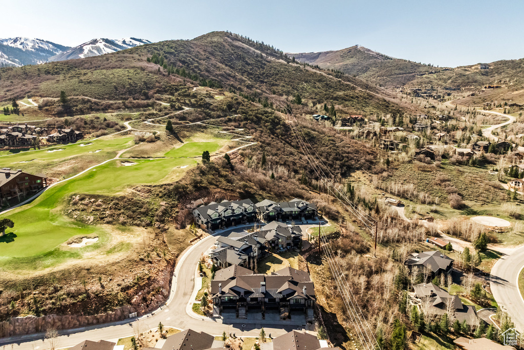 Mountain view with golf course view and a residential view