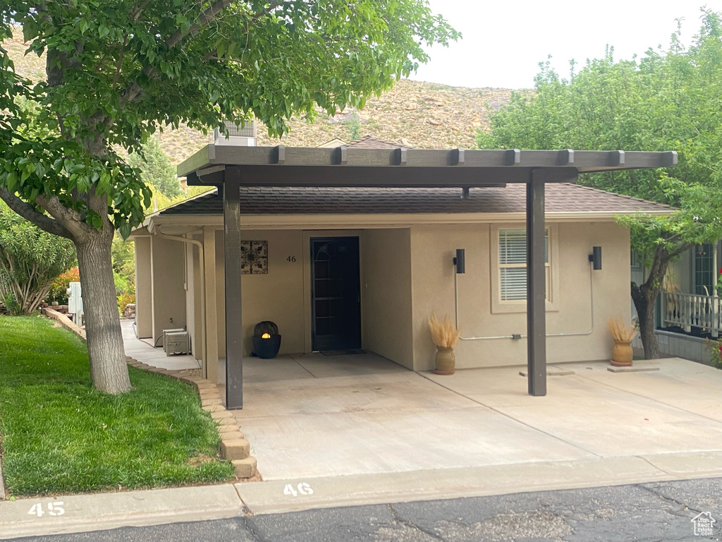 View of front facade with stucco siding