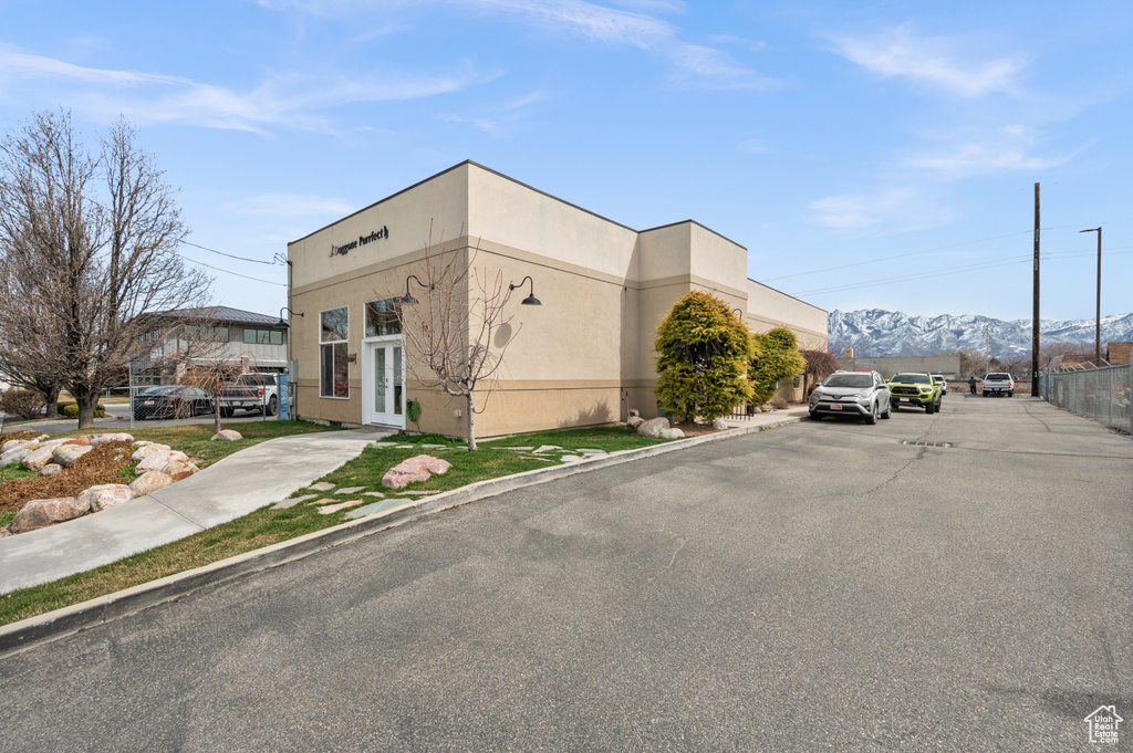 View of property with a mountain view
