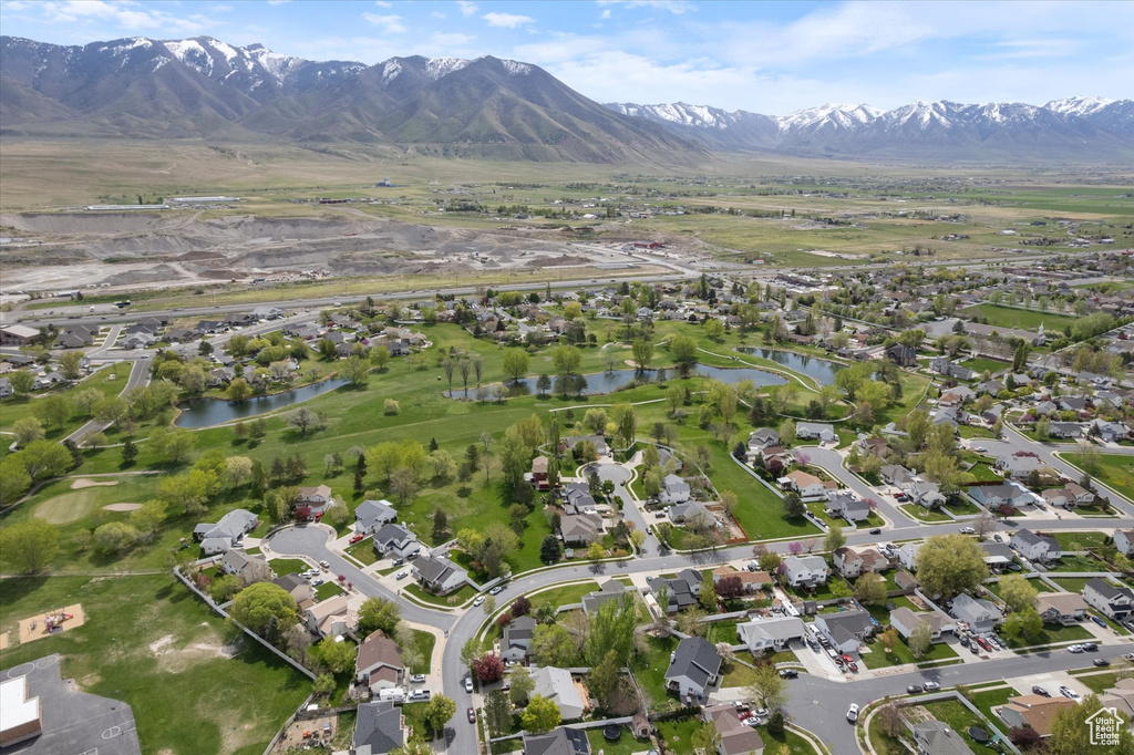 Birds eye view of property featuring a residential view and a water and mountain view