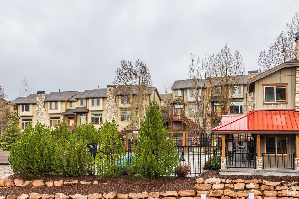 View of property with fence