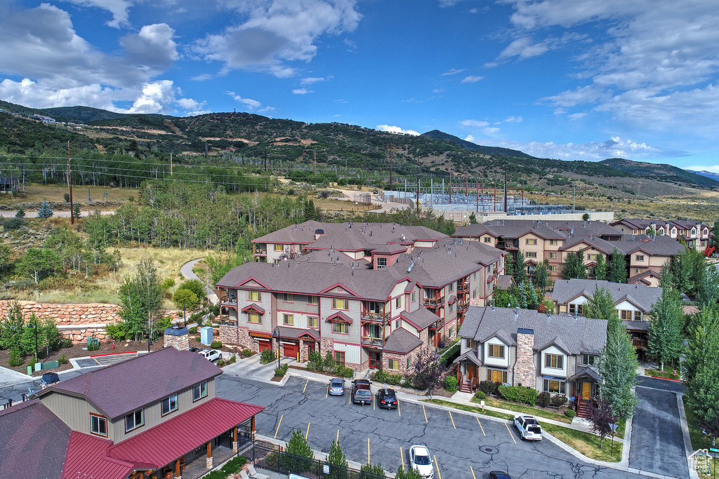 Drone / aerial view with a mountain view and a residential view