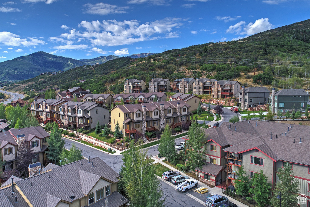 Drone / aerial view featuring a mountain view and a residential view