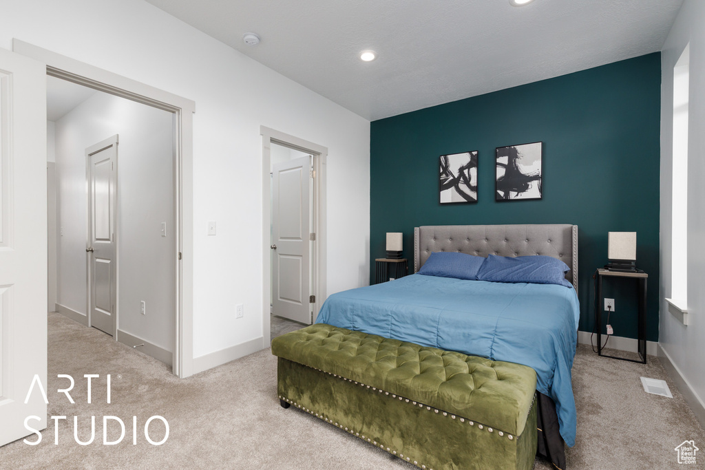 Bedroom with carpet, recessed lighting, and baseboards