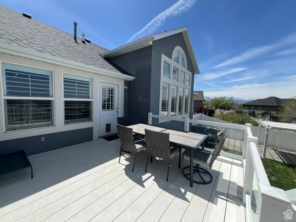 Wooden deck with outdoor dining space