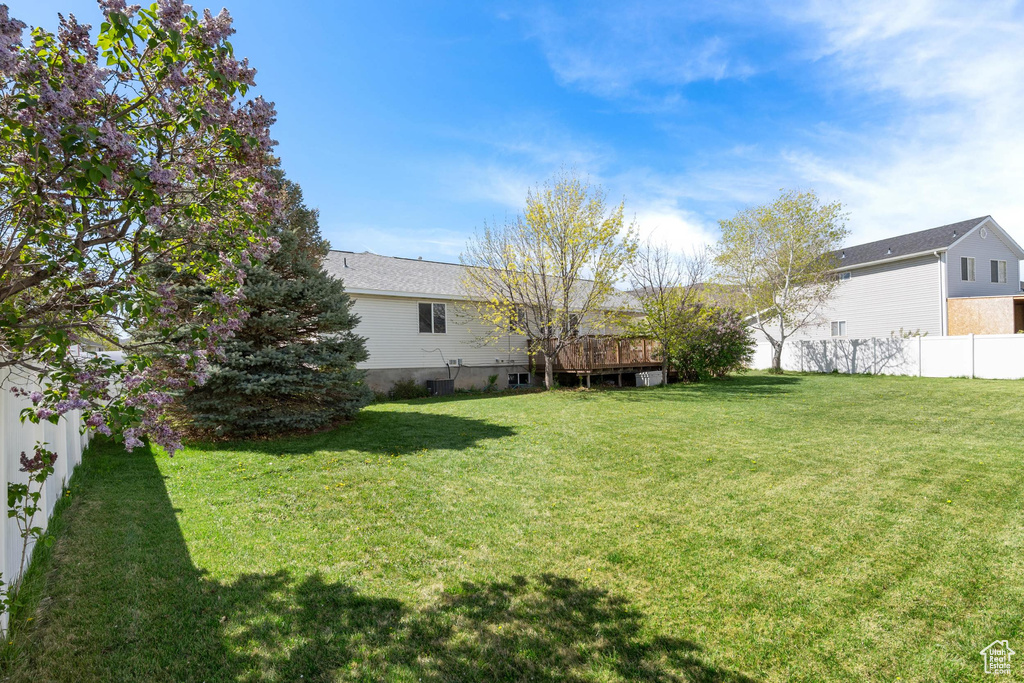 View of yard with fence