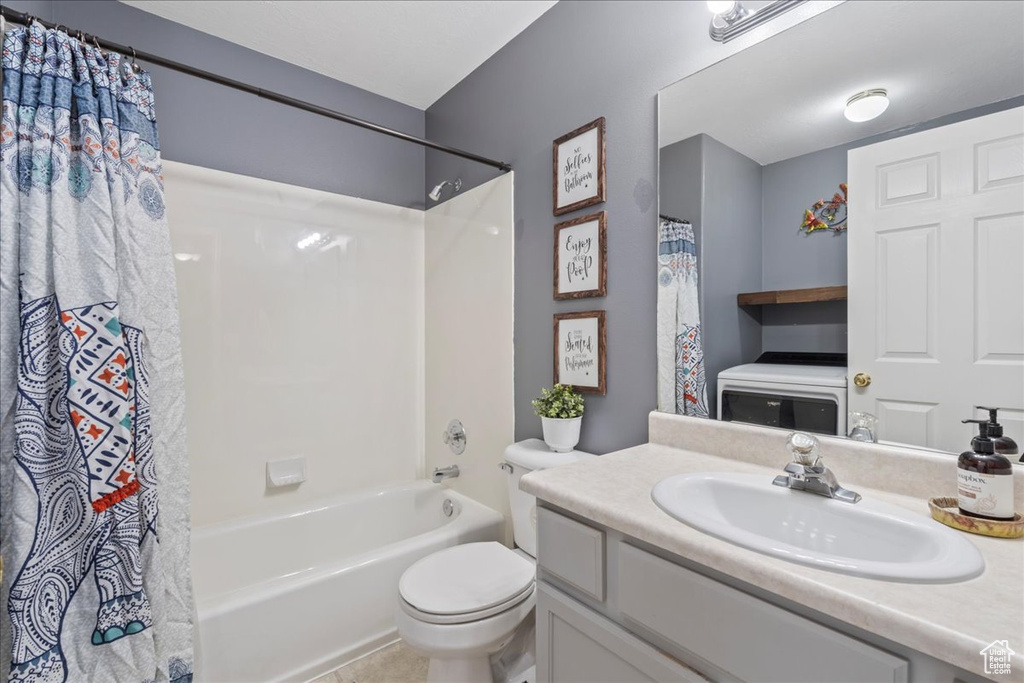 Full bathroom with toilet, shower / bathtub combination with curtain, and vanity