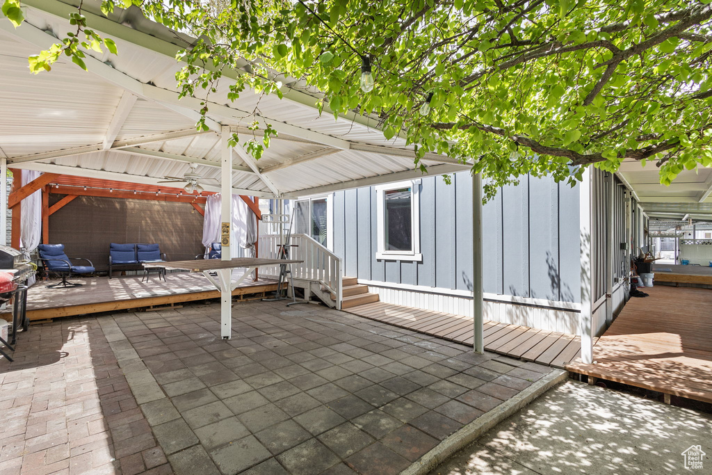 View of patio / terrace featuring a gazebo, outdoor lounge area, and a deck