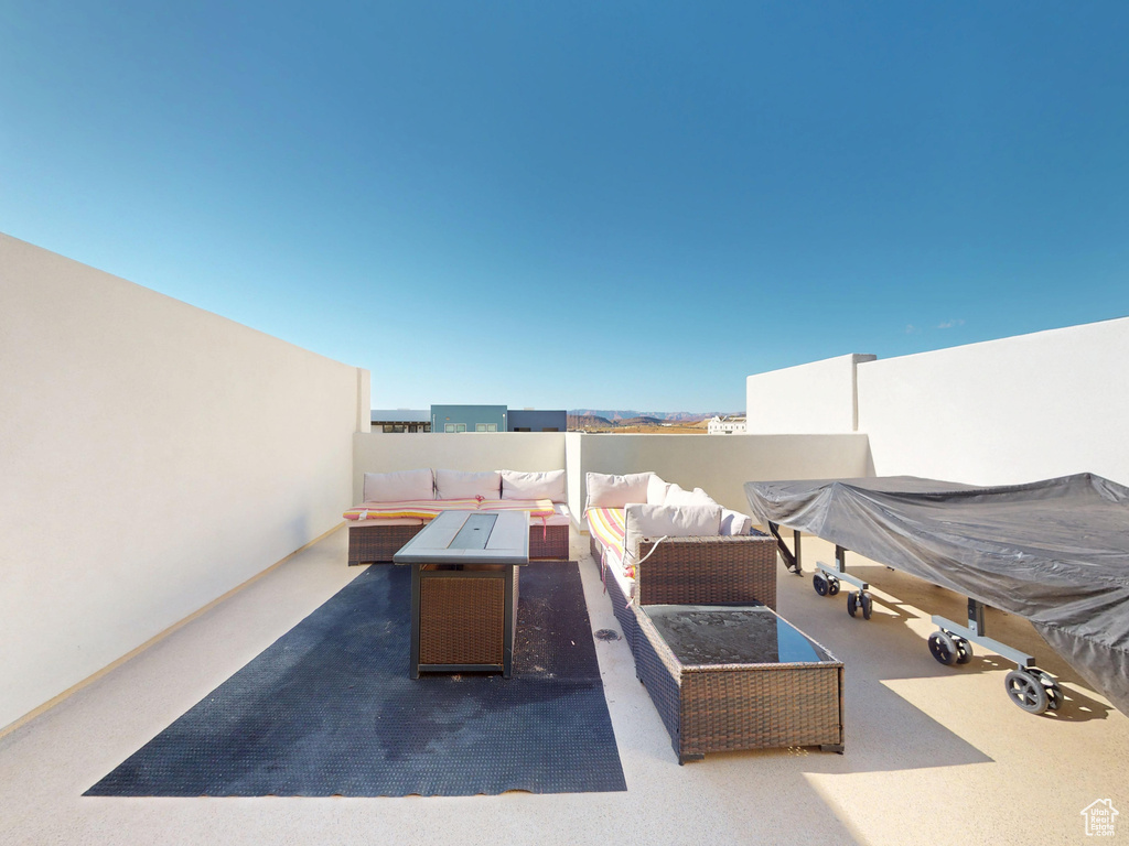 View of patio with outdoor lounge area