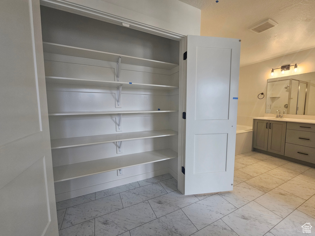 Pantry with a sink