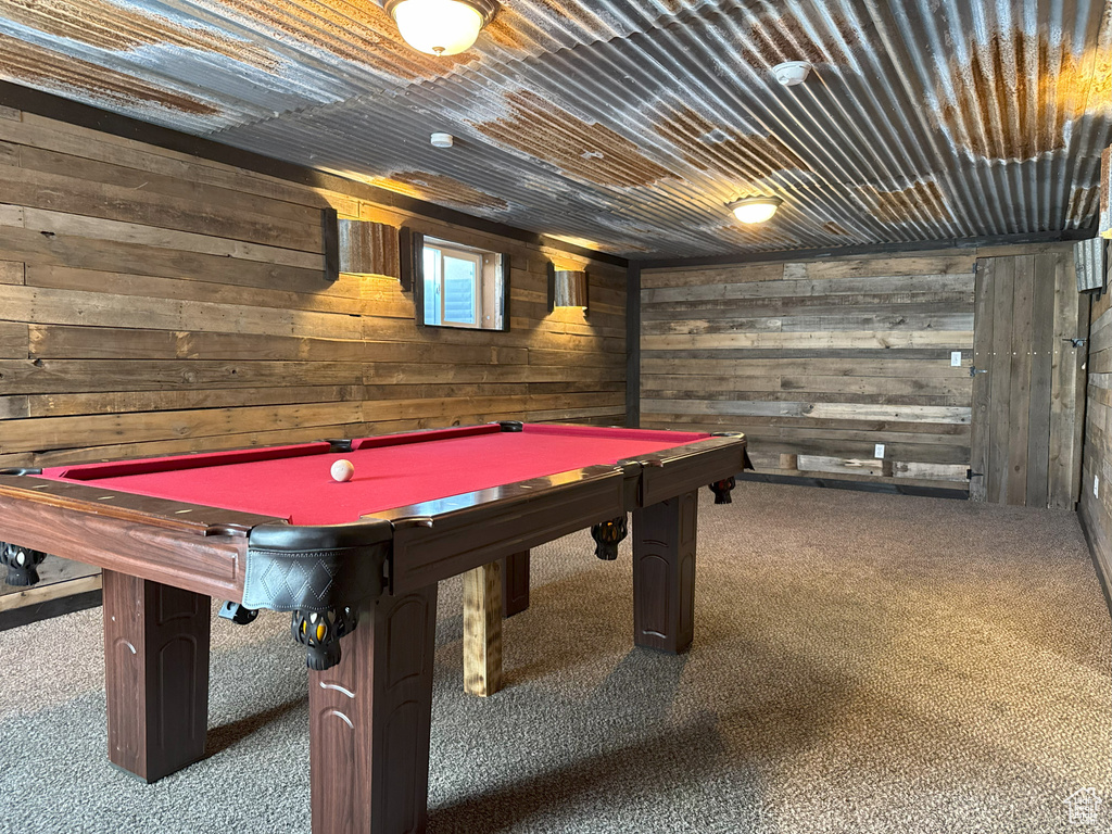 Playroom with wooden walls, billiards, and carpet