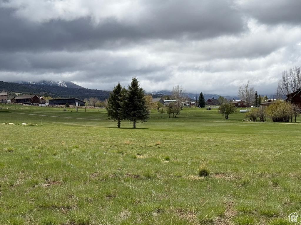 Exterior space with a mountain view and a rural view