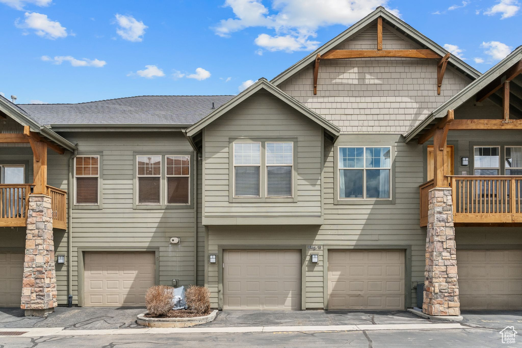 View of front of house with a garage