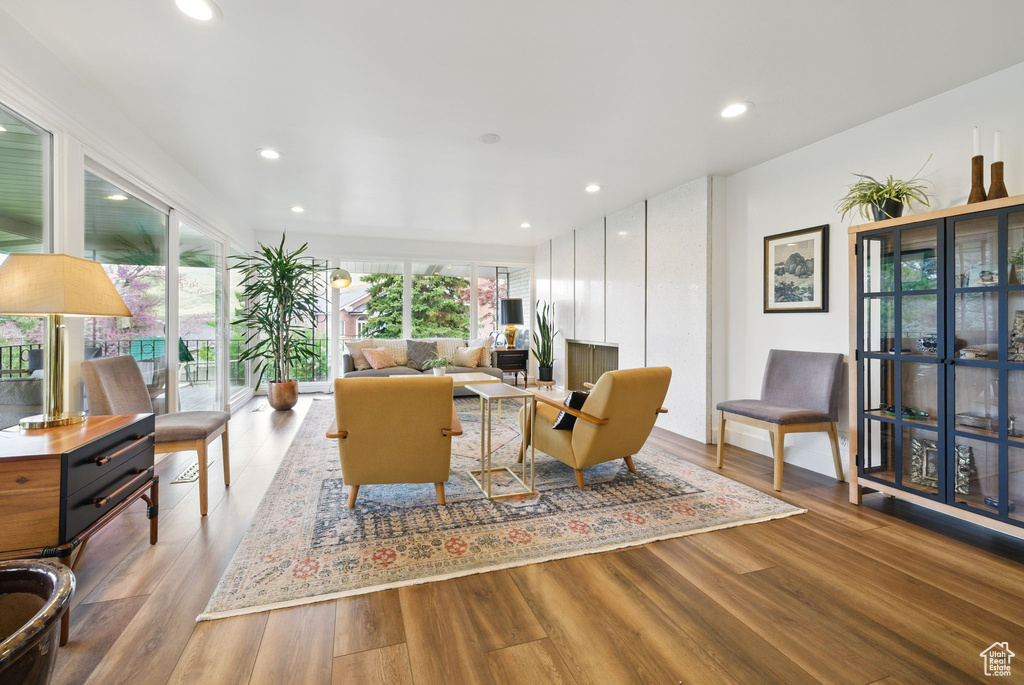 Living area featuring recessed lighting and wood finished floors