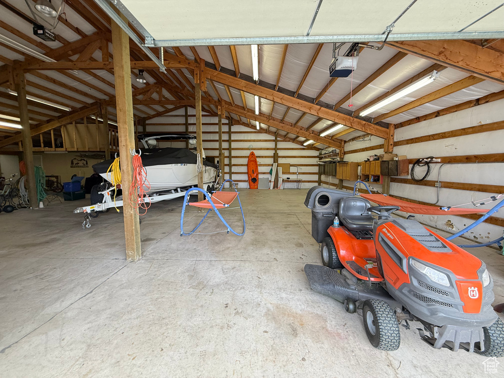 Garage featuring a garage door opener