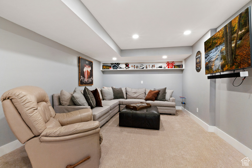 Living area featuring recessed lighting, carpet floors, and baseboards