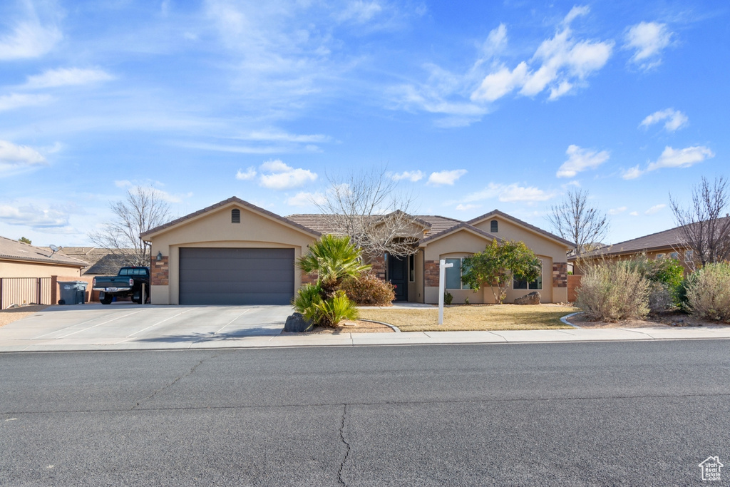 Ranch-style home with a garage