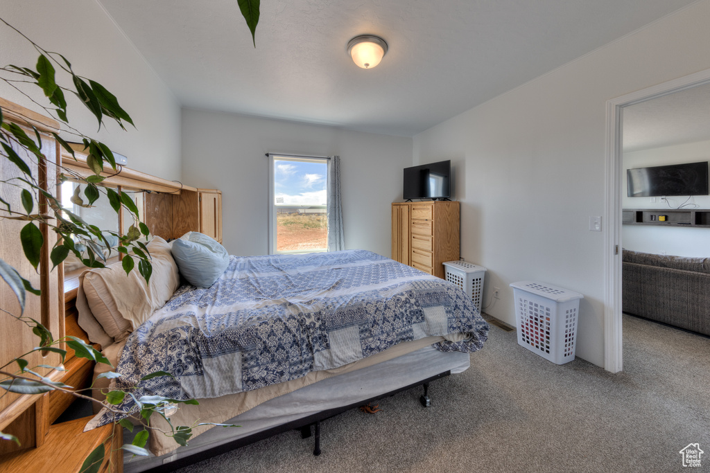 View of carpeted bedroom